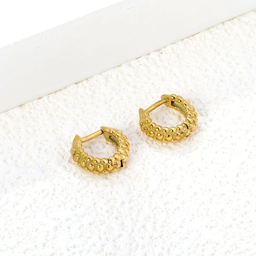 3.8*11.7mm round bumpy earrings gold color