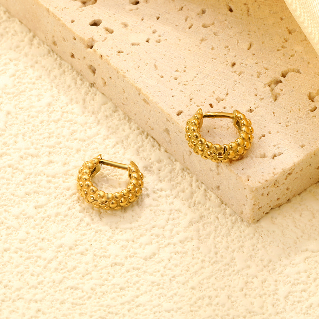 3.8*11.7mm round bumpy earrings gold color