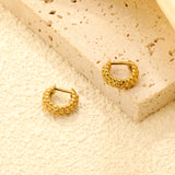3.8*11.7mm round bumpy earrings gold color