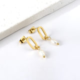 Boucles d'oreilles longues créoles ovales avec perles blanches ovales