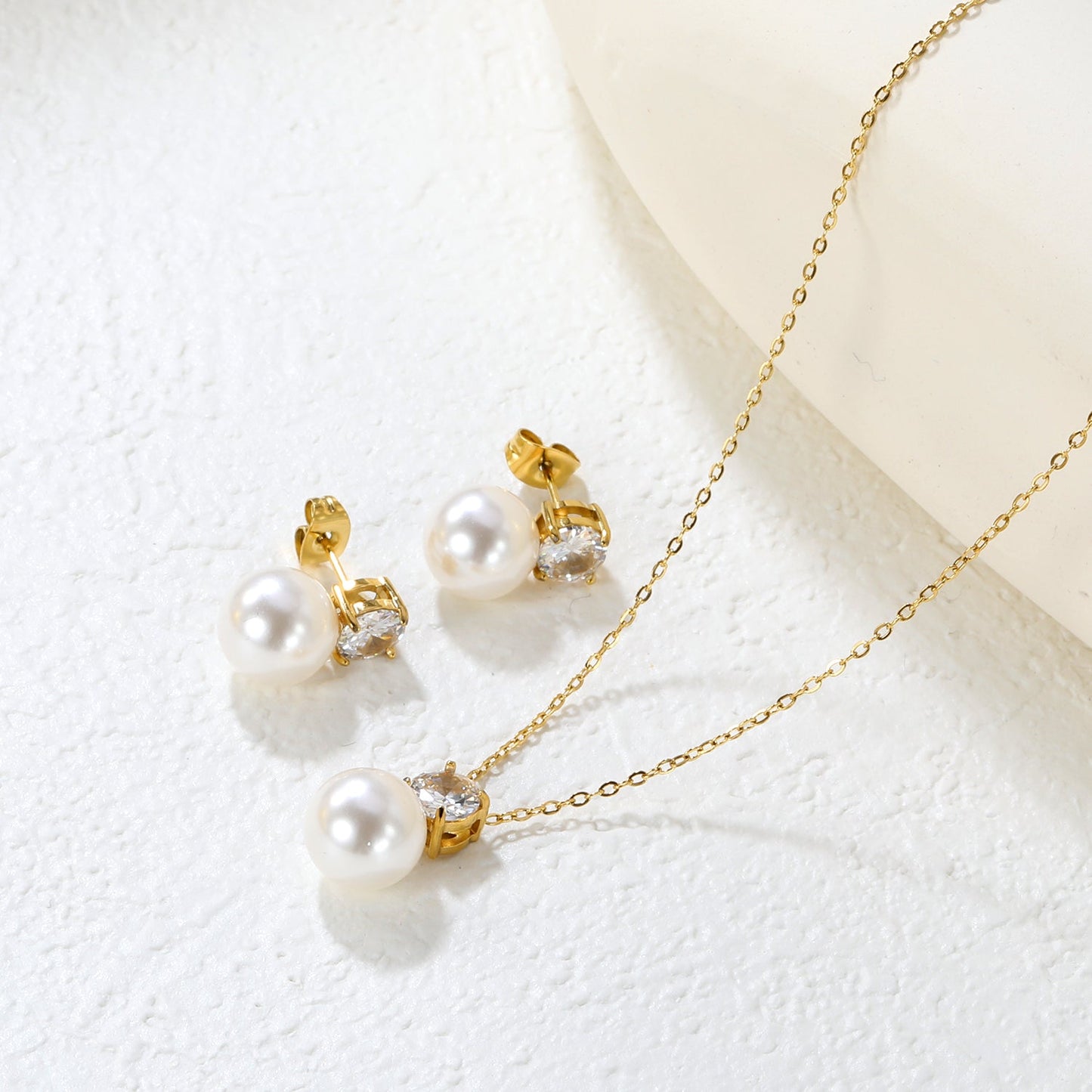 Round White Zirconia + Pearl Set Gold Earrings: 6mm Round White Zirconia + Pearl Earrings 10mm Pendant: 6mm Round White Zirconia + Pearl Pendant 10mm 0.3mm Cross Chain 40+5cm + 6mm Round Pendant asonjewelry