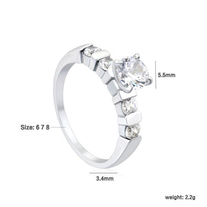 Stainless Steel Ring with Round Diamond & Teardrop Side Stones