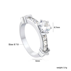 Stainless Steel Ring with Round Center Diamond & Rectangular Side Diamonds