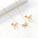 Bow Set Steel Color Earrings:13.2*11.2mm Necklace:13.2*11.2mm0.3 Cross Chain*40+5cm+6mm Round Plaque