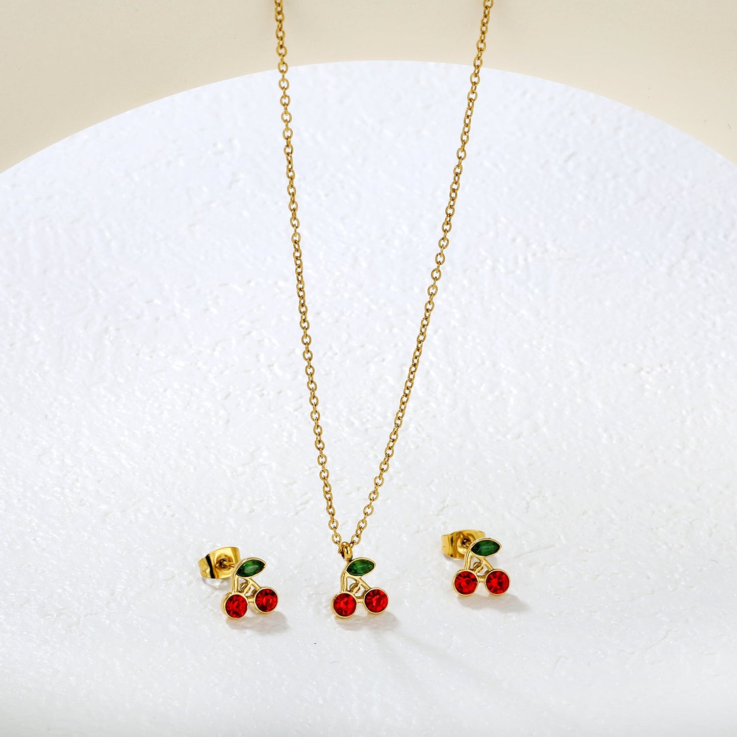Cherry Set Gold Earrings: 8.5 x 8.5 mm Pendant: 8.5 x 8.5 mm 0.3 Cross Chain 40+5 cm + 6 mm Round Pendant asonjewelry