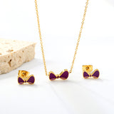 Bow Set Gold Earrings: 10*5.5mm Pendant: 11.8*6.5mm 0.3 Cross Chain 40+5cm+6mm Round Plaque