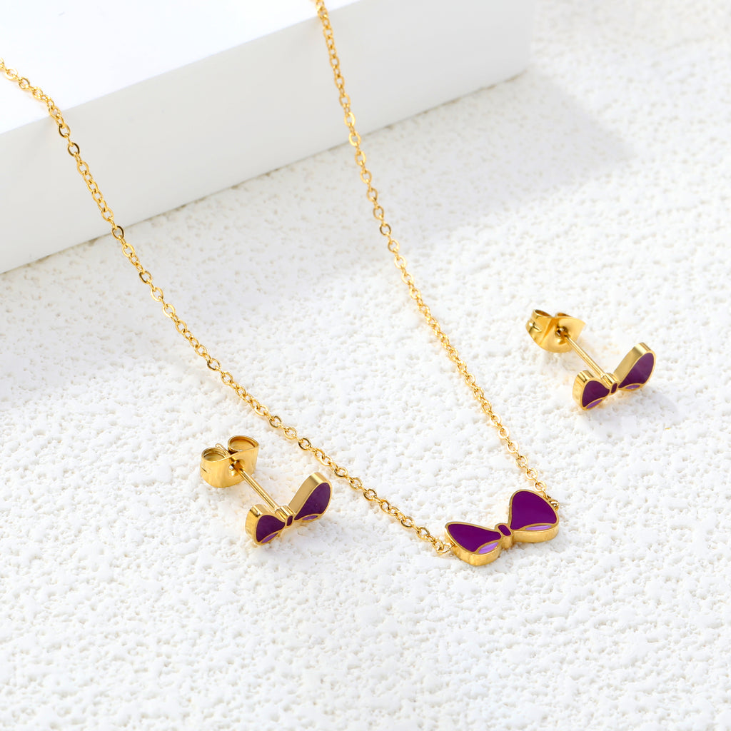 Bow Set Gold Earrings: 10*5.5mm Pendant: 11.8*6.5mm 0.3 Cross Chain 40+5cm+6mm Round Plaque