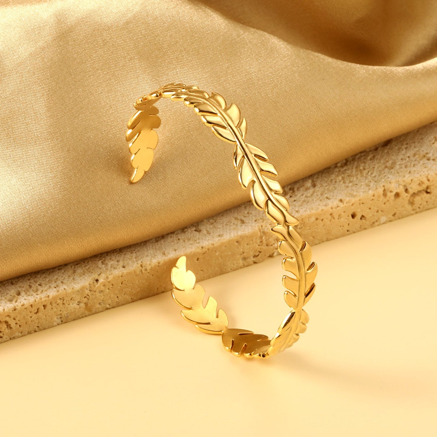 Bracelet with opening of several regular long leaves shapes connected asonjewelry