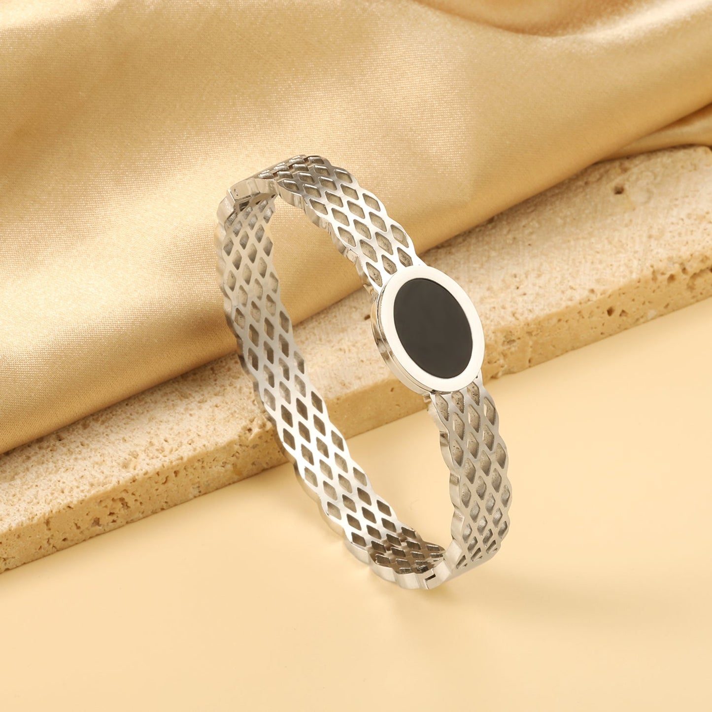 Woven mesh bracelet with black round oil drops. asonjewelry