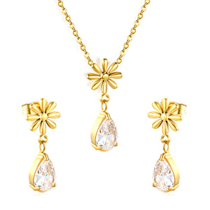 Flower + drop white diamond set Steel / Gold Earrings: 8.3mm flower + 6.2*10mm drop white diamond Pendant: 8.9mm flower + 6.2*10mm drop white diamond 0.3 Cross chain 42+5cm+6mm round plate