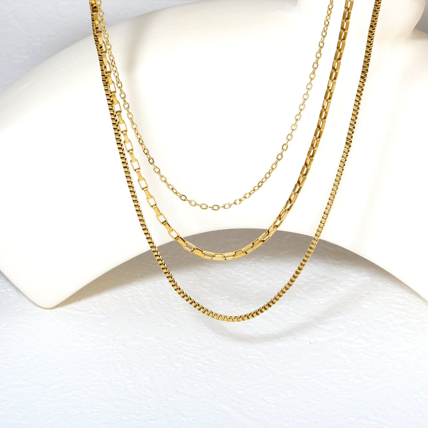Three-tier combination necklace with distinct styles, gold asonjewelry