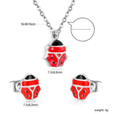 Seven star ladybug set Steel color/golden earrings: 7.3*8.2mm Pendant: 7.3*8.8mm0.3 Cross chain 40+5cm+6mm round plate