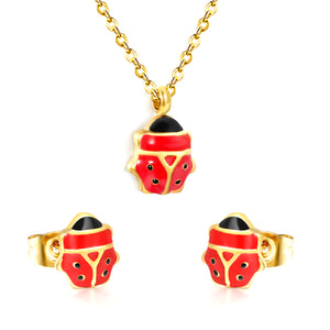 Seven star ladybug set Steel color/golden earrings: 7.3*8.2mm Pendant: 7.3*8.8mm0.3 Cross chain 40+5cm+6mm round plate