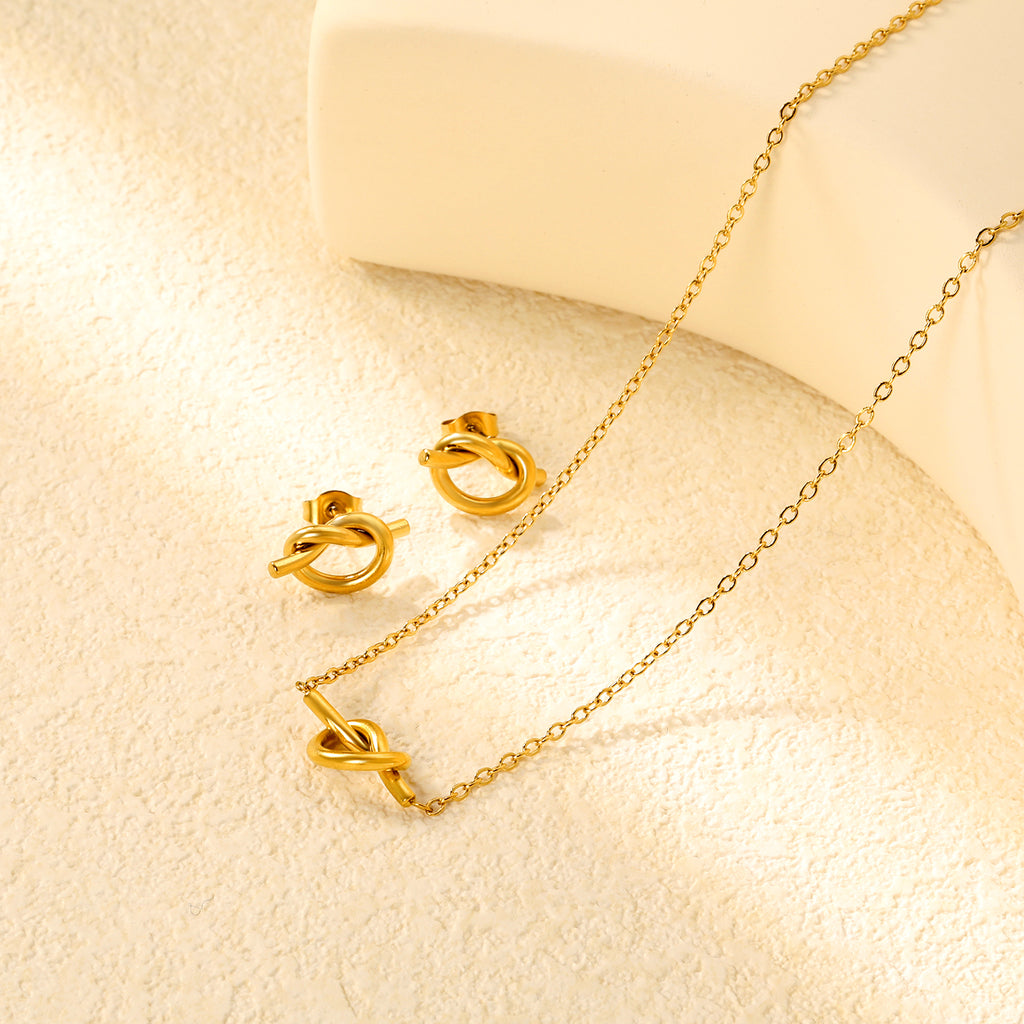 Knotting Set Gold Earrings: 16.8*8.6mm Pendant: 16.8*8.6mm0.35 Cross Link Chain 42+5cm+6mm Round Tail Plaque