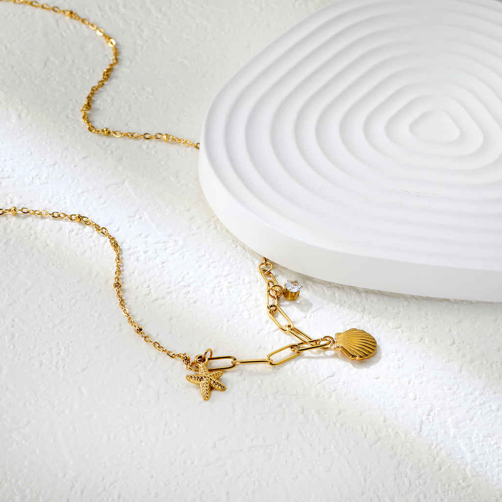 10.2*10.7mm shell+9*12.7mm starfish+4.2mm cylindrical white diamonds 42+5cm+10*3cm necklace steel/golden