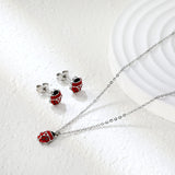 Seven star ladybug set Steel color/golden earrings: 7.3*8.2mm Pendant: 7.3*8.8mm0.3 Cross chain 40+5cm+6mm round plate