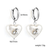3x15mm circle with heart shaped white pearl + cherry stud earrings steel color / gold color