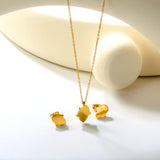 Glossy set Gold/light blue Earrings: 8.7*10.8mm Pendant: 10.7*13.6mm 0.3 cross chain 40+5cm+6mm round plate