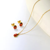 Seven star ladybug set Steel color/golden earrings: 7.3*8.2mm Pendant: 7.3*8.8mm0.3 Cross chain 40+5cm+6mm round plate
