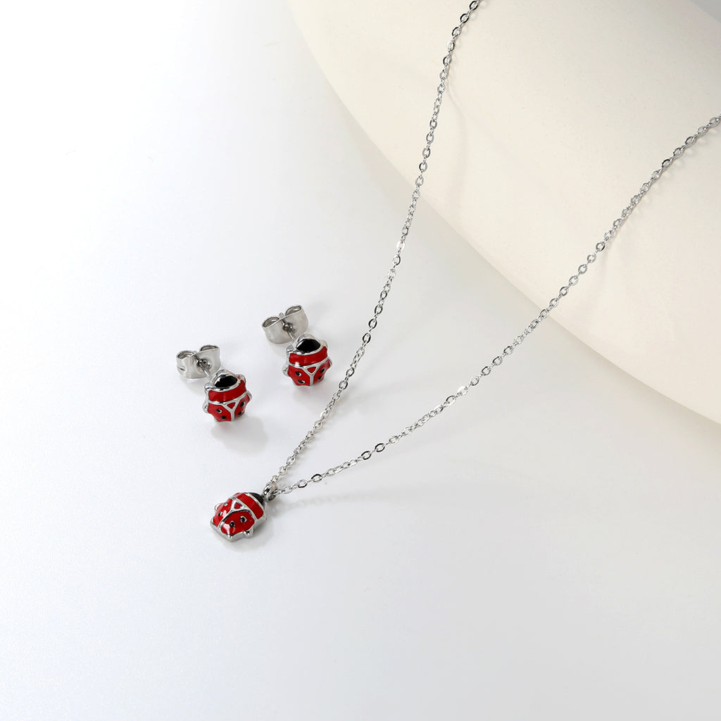 Seven star ladybug set Steel color/golden earrings: 7.3*8.2mm Pendant: 7.3*8.8mm0.3 Cross chain 40+5cm+6mm round plate