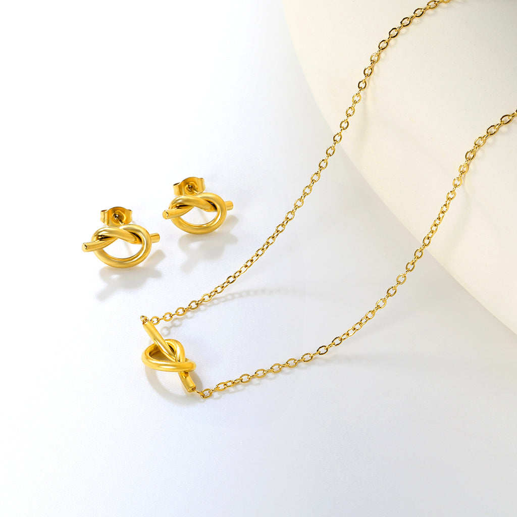 Knotting Set Gold Earrings: 16.8*8.6mm Pendant: 16.8*8.6mm0.35 Cross Link Chain 42+5cm+6mm Round Tail Plaque