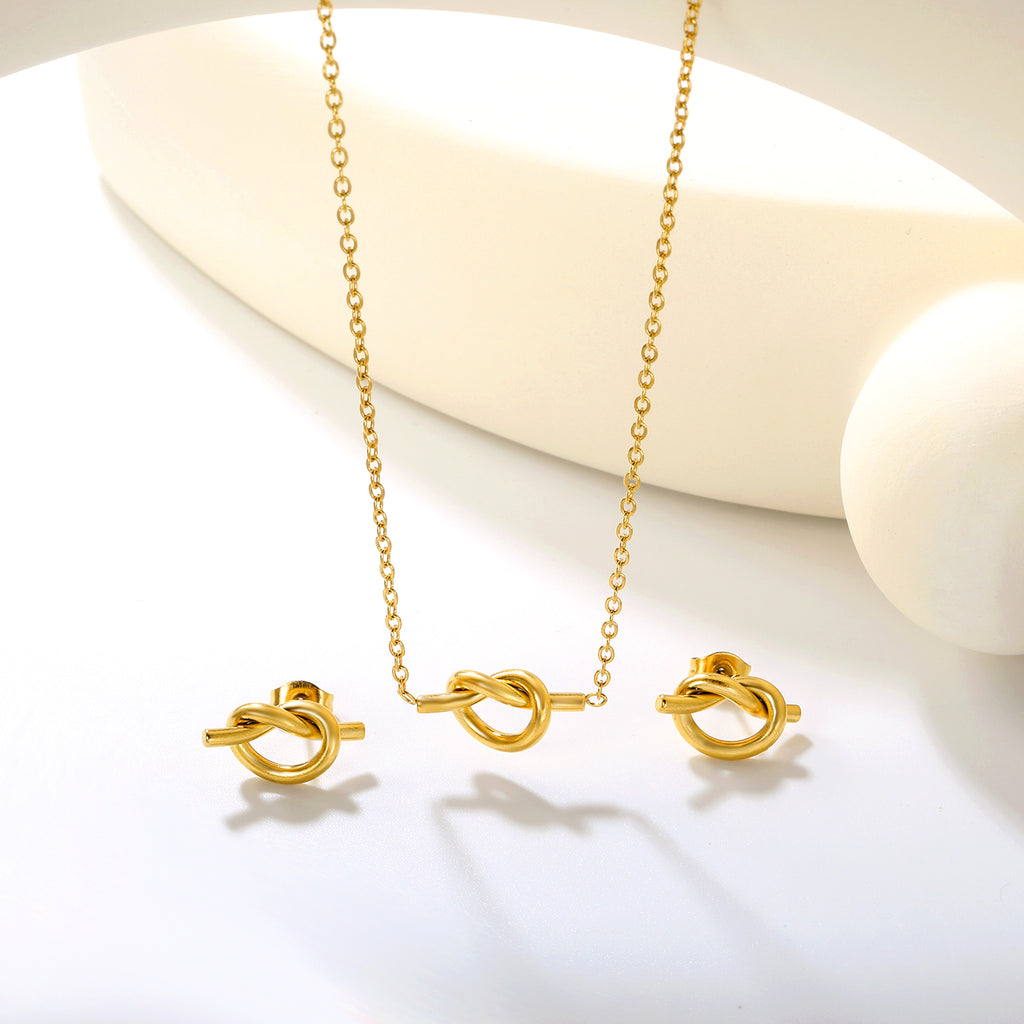 Knotting Set Gold Earrings: 16.8*8.6mm Pendant: 16.8*8.6mm0.35 Cross Link Chain 42+5cm+6mm Round Tail Plaque