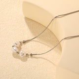 3 imitation pearls + 4 steel beads + round snake chain with round pendant Necklace in steel/gold