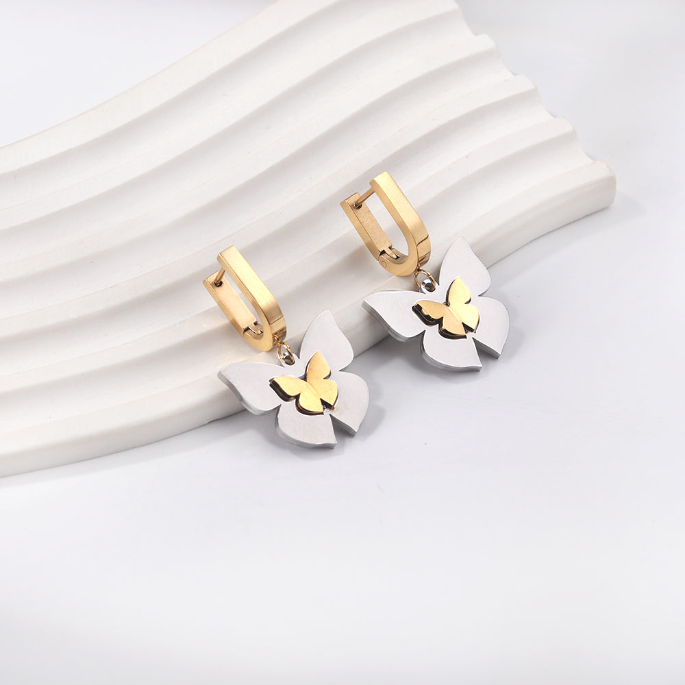 Gold coloured U-shaped ear clips with graduated gold sized butterfly studs asonjewelry