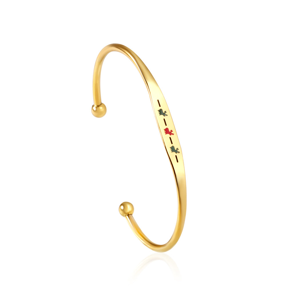 Hard bracelet with oil-drip pattern on gold-colored surface asonjewelry