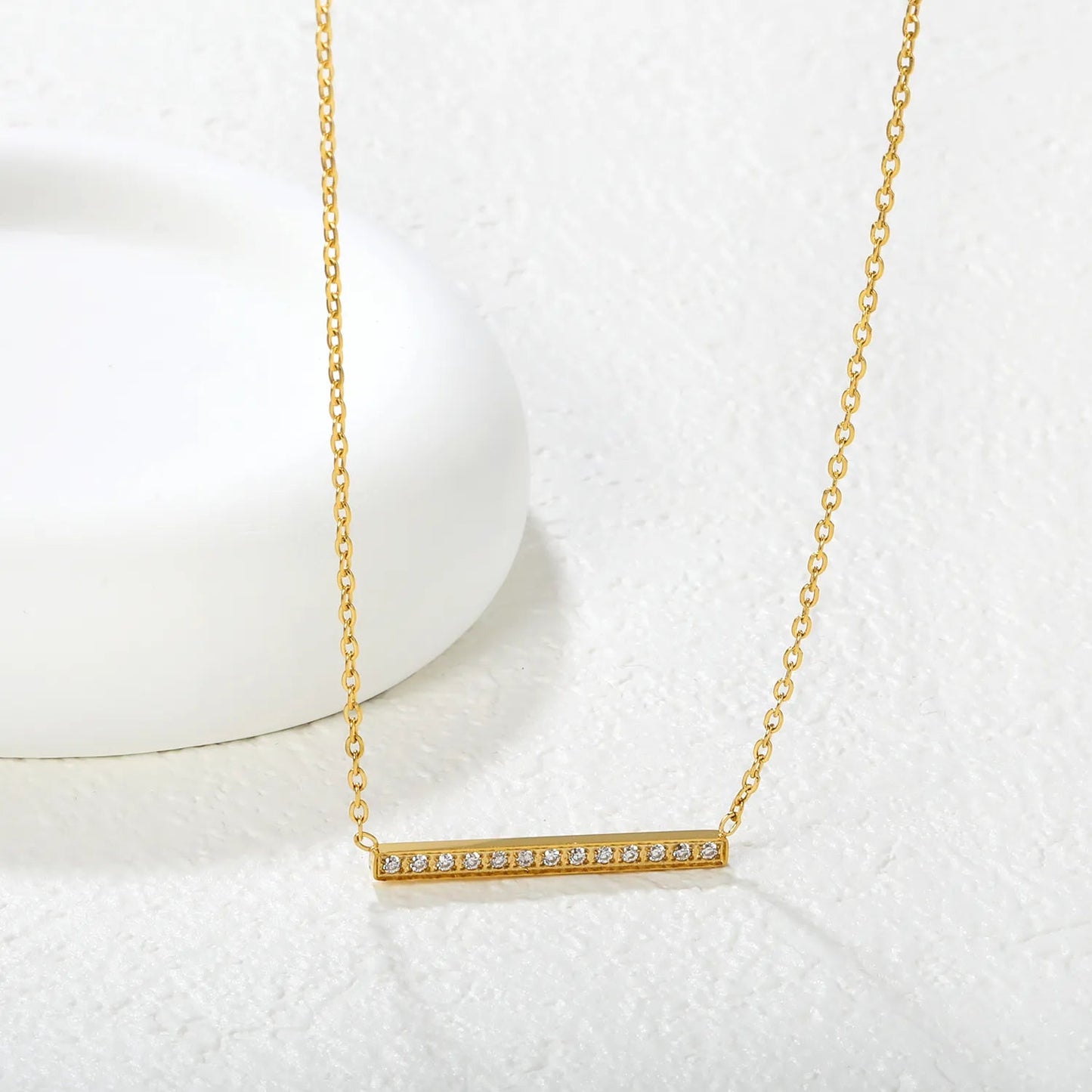 29.6 * 2.6mm single-cut CNC diamond pendant with 0.4 cross chain, 40 + 5cm + 6mm round tail tag. Necklace in gold asonjewelry