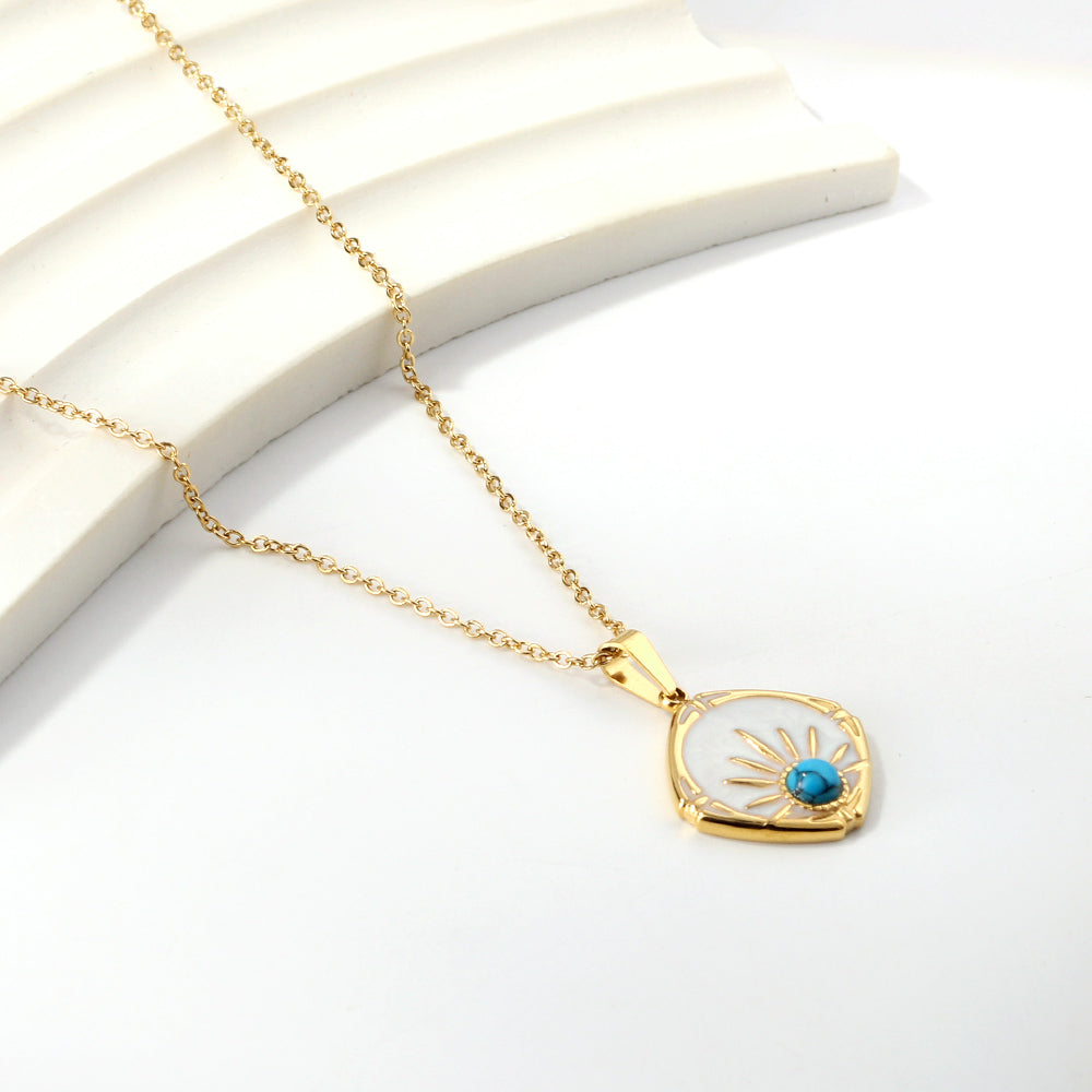 Collier pendentif oeil serti turquoise