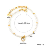 8.5 x 8.8mm beaded heart-shaped pendant with white/black/red/pink/green zirconia stones, 3.2mm white pearl beads + 3mm small steel beads, 18+3cm + 6mm round pendant, gold-colored bracelet