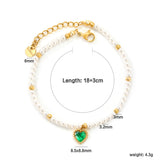 8.5 x 8.8mm beaded heart-shaped pendant with white/black/red/pink/green zirconia stones, 3.2mm white pearl beads + 3mm small steel beads, 18+3cm + 6mm round pendant, gold-colored bracelet