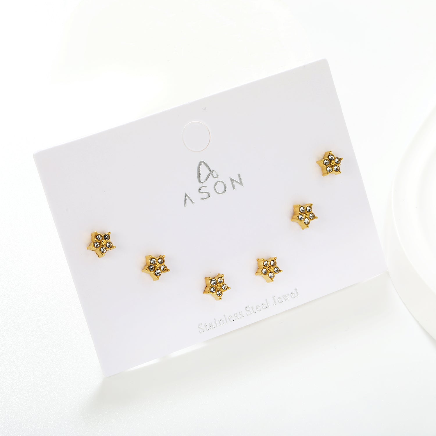 3 pairs of 5mm star stud earrings with white rhinestones in gold asonjewelry