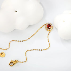 8.4*10.4mm oval with CNC white zirconium circle + garnet red real zirconium accessories bracelet 17+3cm + 6mm round end tag steel color/golden