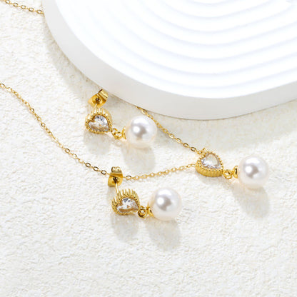 Heart-Shaped White Zirconia + Pearl Set Gold Ear Studs: 8.5mm Heart-Shaped White Zirconia + Pearl Earrings 10mm Pendant: 8.5mm Heart-Shaped White Zirconia + Pearl Pendant 10mm 0.3 Cross Chain 40+5cm+6mm Round Pendant asonjewelry
