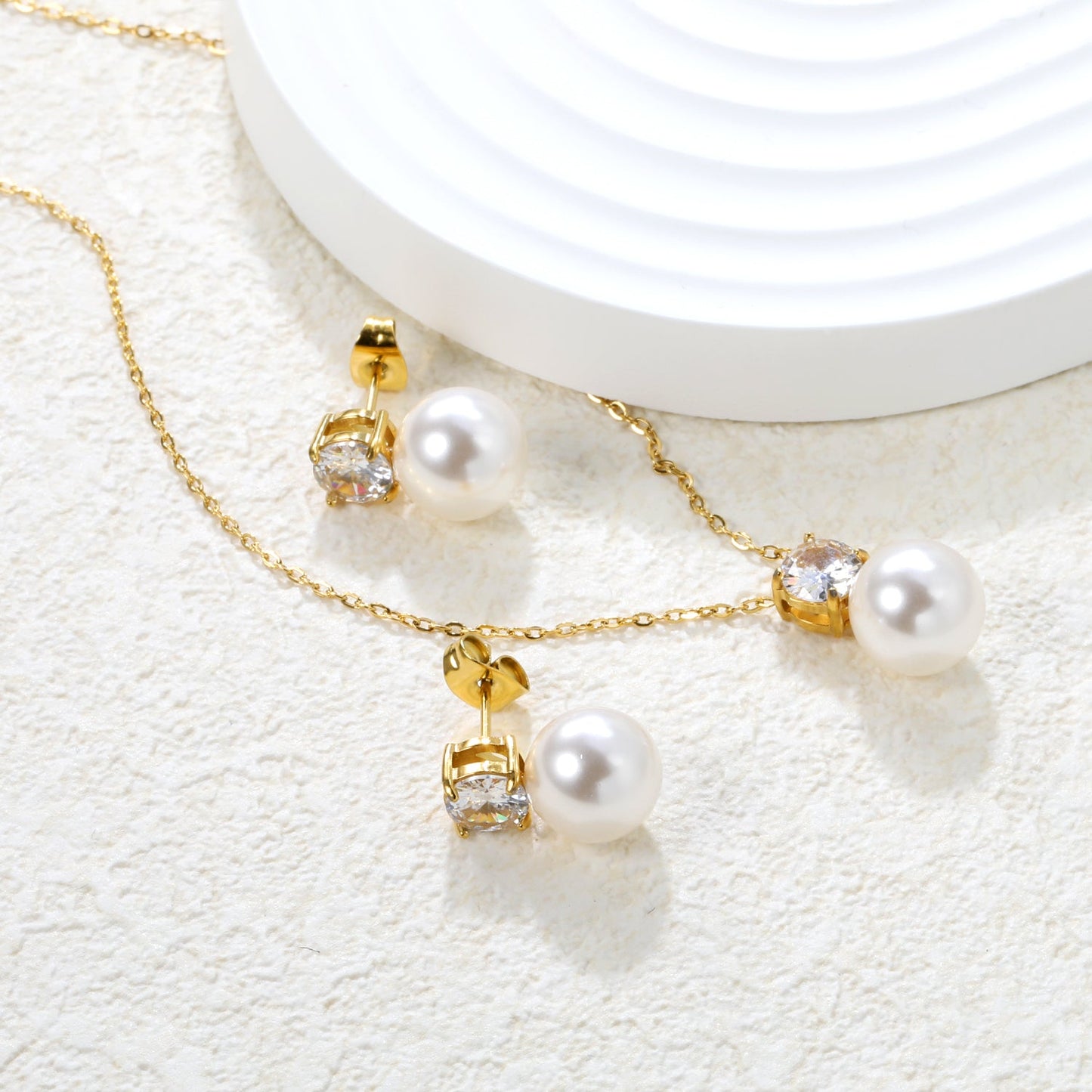 Round White Zirconia + Pearl Set Gold Earrings: 6mm Round White Zirconia + Pearl Earrings 10mm Pendant: 6mm Round White Zirconia + Pearl Pendant 10mm 0.3mm Cross Chain 40+5cm + 6mm Round Pendant asonjewelry