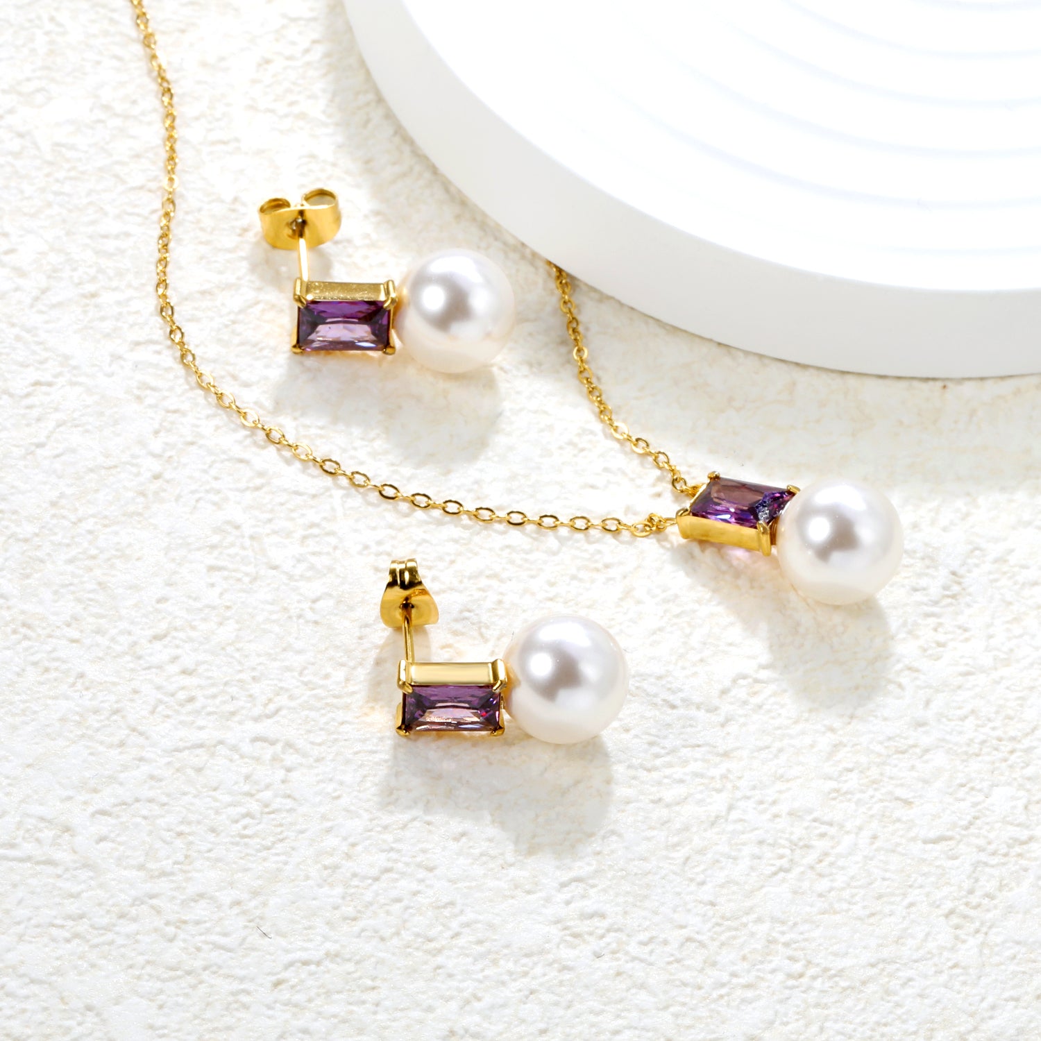 Rectangular purple zirconia + pearl earrings Rectangular purple zirconia + pearl earrings Pendant: Rectangular purple zirconia + pearl pendant asonjewelry