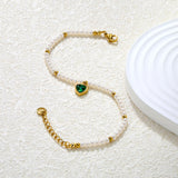 8.5 x 8.8mm beaded heart-shaped pendant with white/black/red/pink/green zirconia stones, 3.2mm white pearl beads + 3mm small steel beads, 18+3cm + 6mm round pendant, gold-colored bracelet