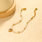 8.5 x 8.8mm beaded heart-shaped pendant with white/black/red/pink/green zirconia stones, 3.2mm white pearl beads + 3mm small steel beads, 18+3cm + 6mm round pendant, gold-colored bracelet