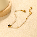 8.5 x 8.8mm beaded heart-shaped pendant with white/black/red/pink/green zirconia stones, 3.2mm white pearl beads + 3mm small steel beads, 18+3cm + 6mm round pendant, gold-colored bracelet