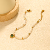 8.5 x 8.8mm beaded heart-shaped pendant with white/black/red/pink/green zirconia stones, 3.2mm white pearl beads + 3mm small steel beads, 18+3cm + 6mm round pendant, gold-colored bracelet