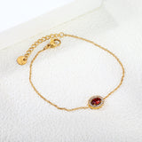 8.4*10.4mm oval with CNC white zirconium circle + garnet red real zirconium accessories bracelet 17+3cm + 6mm round end tag steel color/golden
