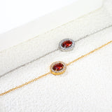 8.4*10.4mm oval with CNC white zirconium circle + garnet red real zirconium accessories bracelet 17+3cm + 6mm round end tag steel color/golden