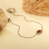 8.4*10.4mm oval with CNC white zirconium circle + garnet red real zirconium accessories bracelet 17+3cm + 6mm round end tag steel color/golden