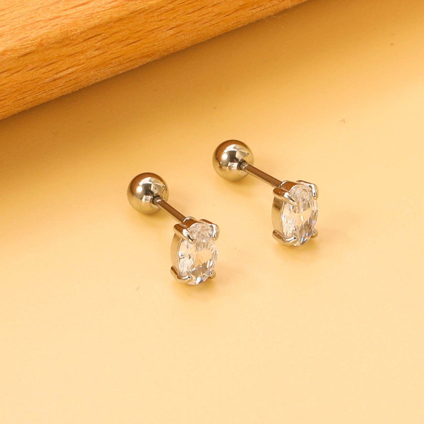 Steel ball screw-in oval earrings with white diamonds 4*6mm asonjewelry