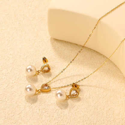 Heart-Shaped White Zirconia + Pearl Set Gold Ear Studs: 8.5mm Heart-Shaped White Zirconia + Pearl Earrings 10mm Pendant: 8.5mm Heart-Shaped White Zirconia + Pearl Pendant 10mm 0.3 Cross Chain 40+5cm+6mm Round Pendant asonjewelry
