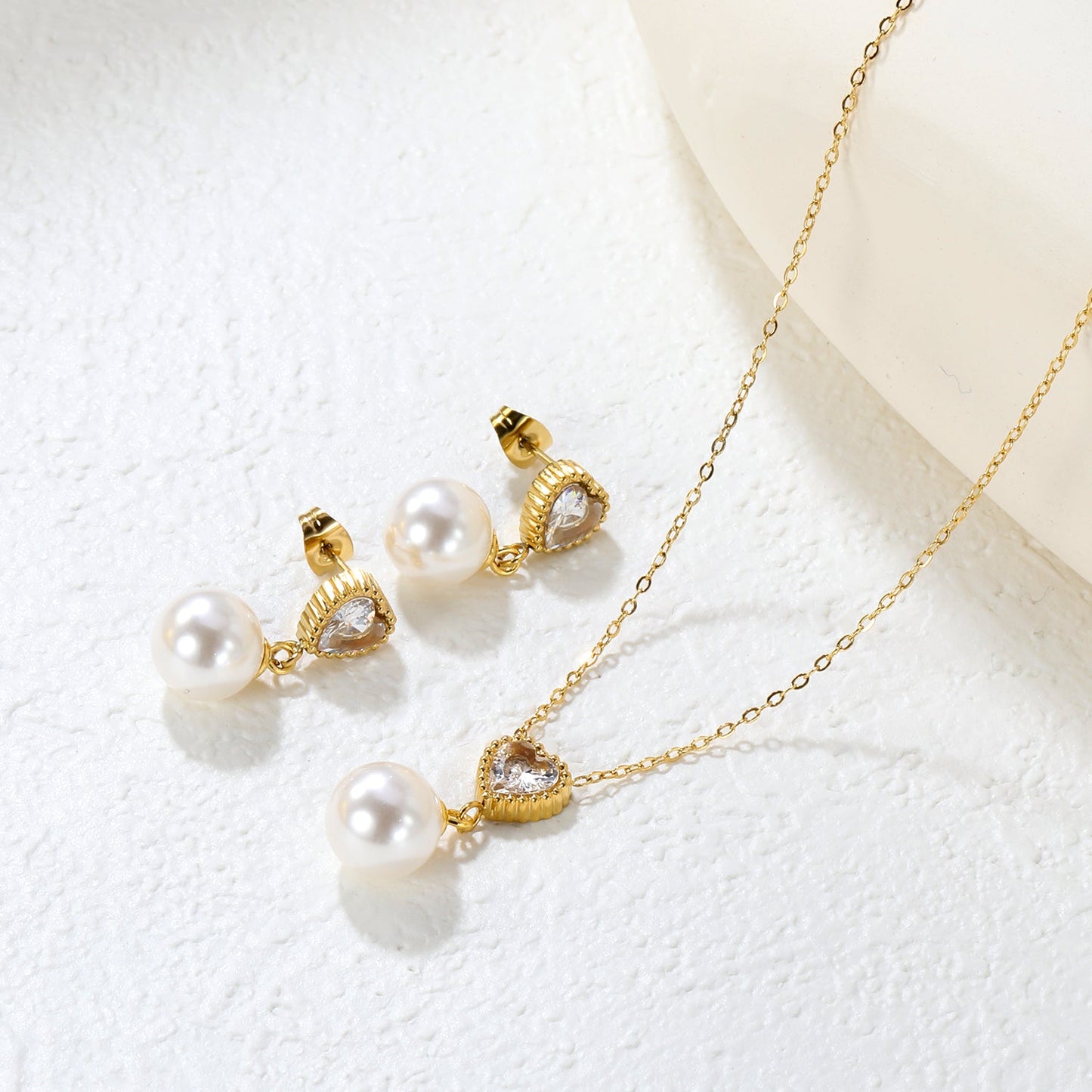 Heart-Shaped White Zirconia + Pearl Set Gold Ear Studs: 8.5mm Heart-Shaped White Zirconia + Pearl Earrings 10mm Pendant: 8.5mm Heart-Shaped White Zirconia + Pearl Pendant 10mm 0.3 Cross Chain 40+5cm+6mm Round Pendant asonjewelry