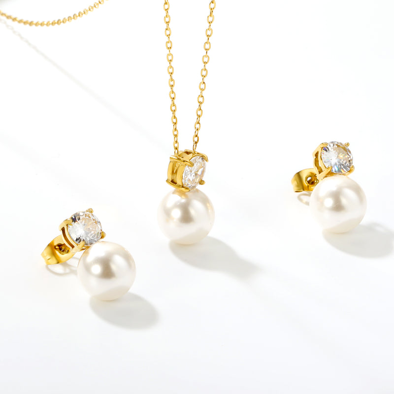 Round White Zirconia + Pearl Set Gold Earrings: 6mm Round White Zirconia + Pearl Earrings 10mm Pendant: 6mm Round White Zirconia + Pearl Pendant 10mm 0.3mm Cross Chain 40+5cm + 6mm Round Pendant