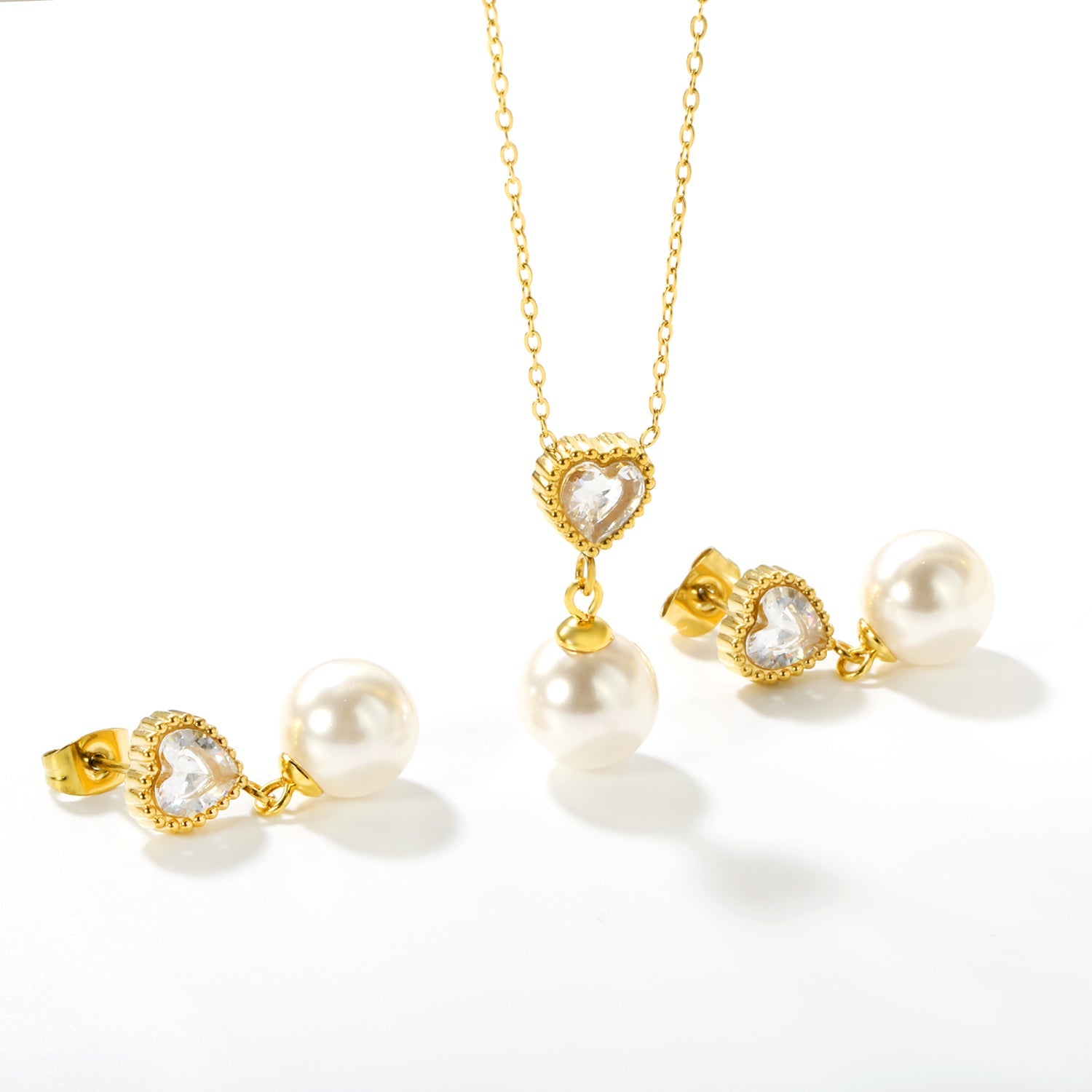 Heart-Shaped White Zirconia + Pearl Set Gold Ear Studs: 8.5mm Heart-Shaped White Zirconia + Pearl Earrings 10mm Pendant: 8.5mm Heart-Shaped White Zirconia + Pearl Pendant 10mm 0.3 Cross Chain 40+5cm+6mm Round Pendant asonjewelry